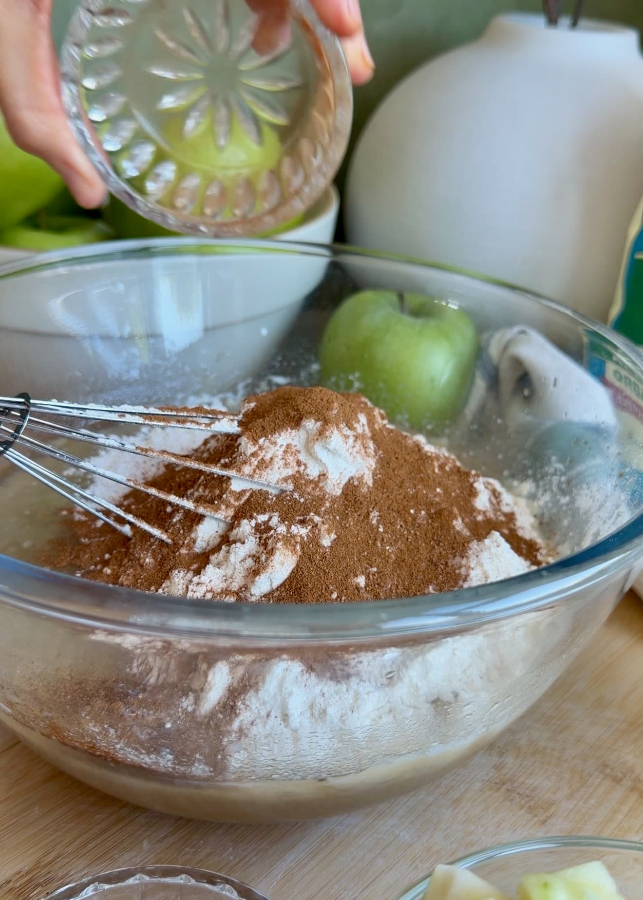 Flour and warm spices added to Apple Fritter Donut Loaf batter