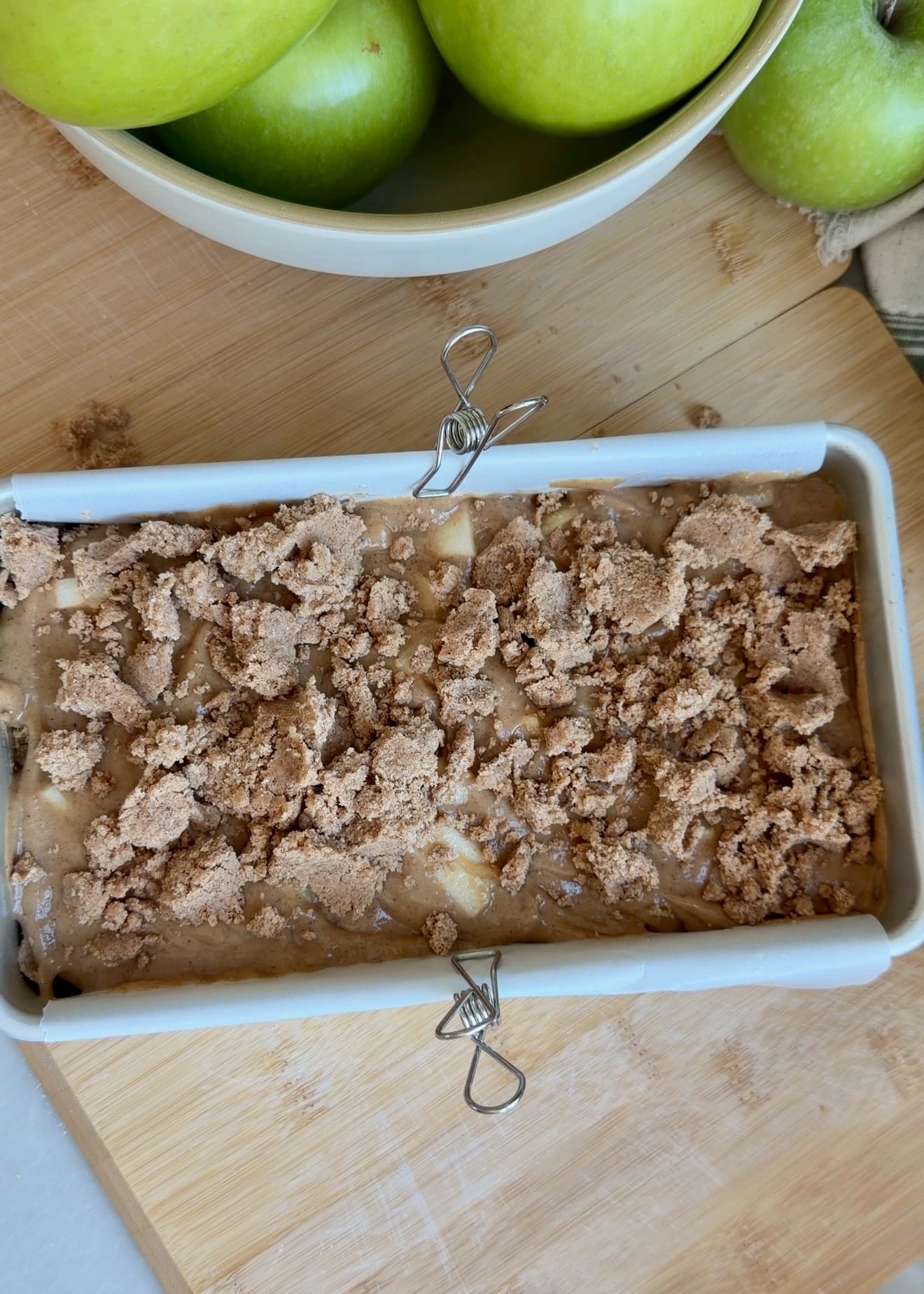 Apple Fritter Donut Loaf covered with cinnamon streusel before baking