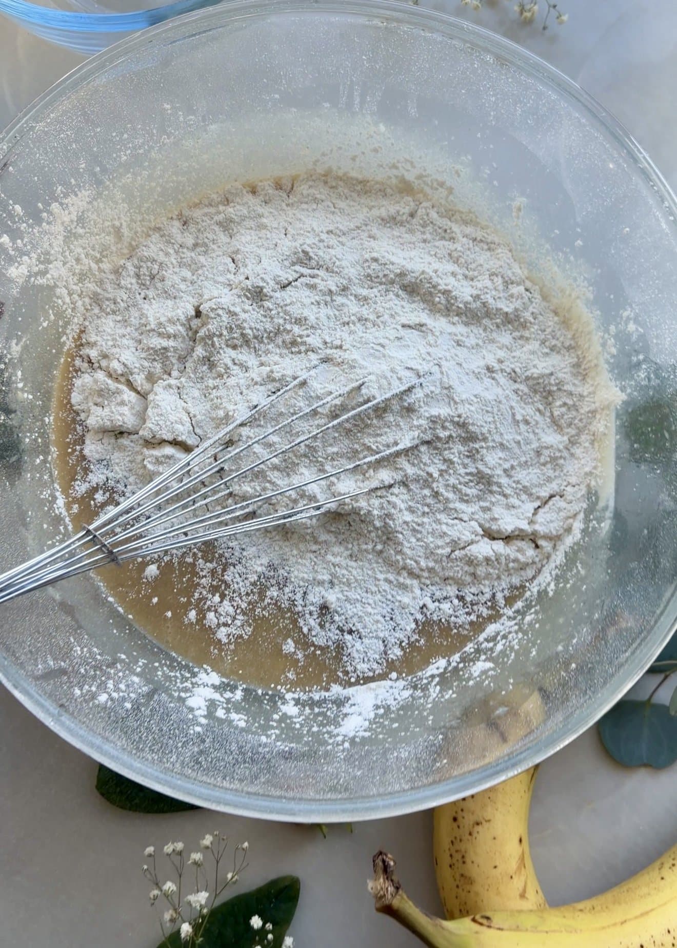 Dry ingredients in a bowl with a whisk