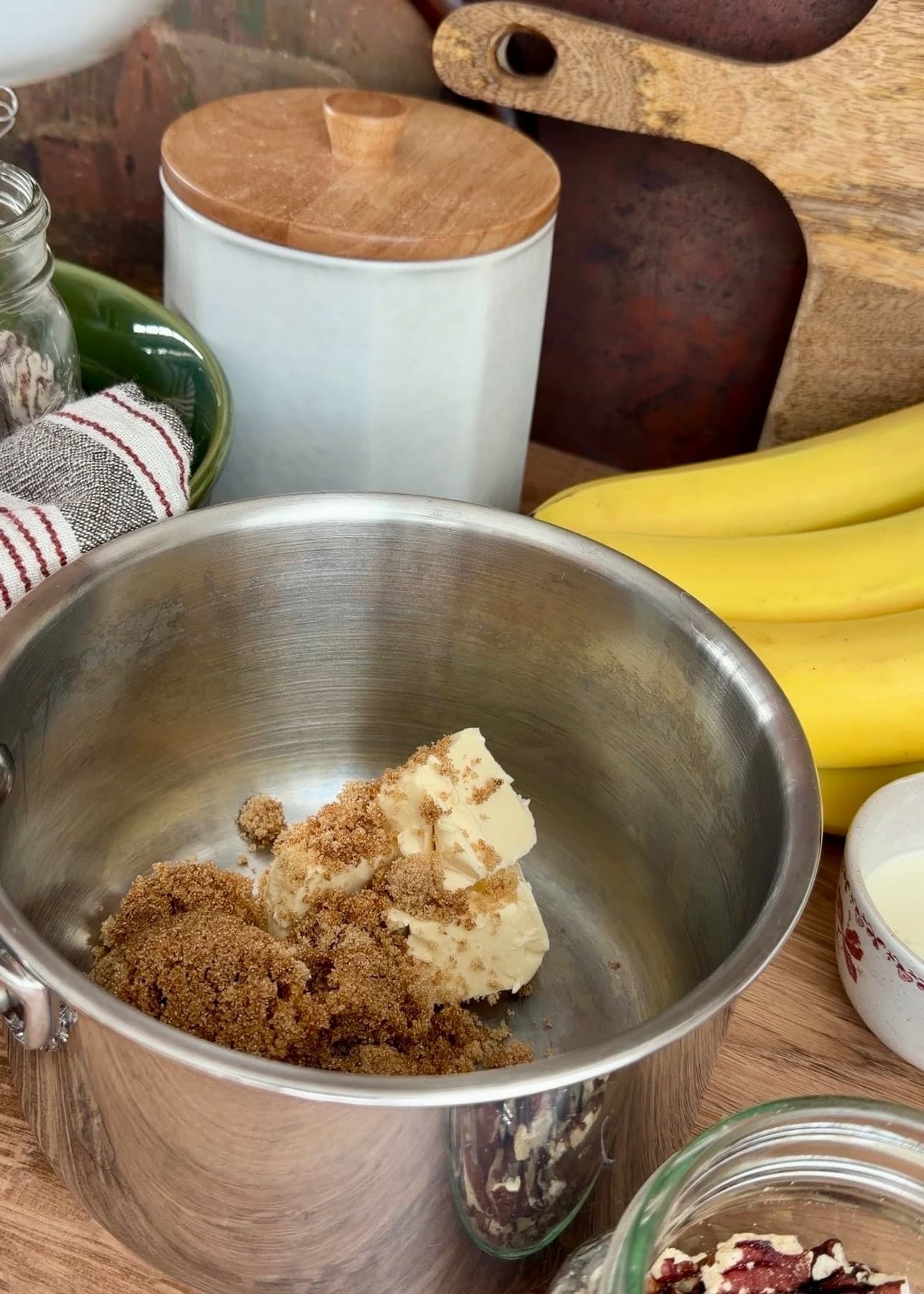 Butter and brown sugar together in a saucepan before heating