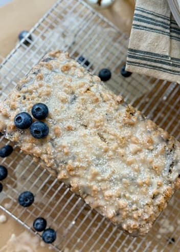 Overhead view of the finished glazed Blueberry Old-Fashioned Donut Loaf