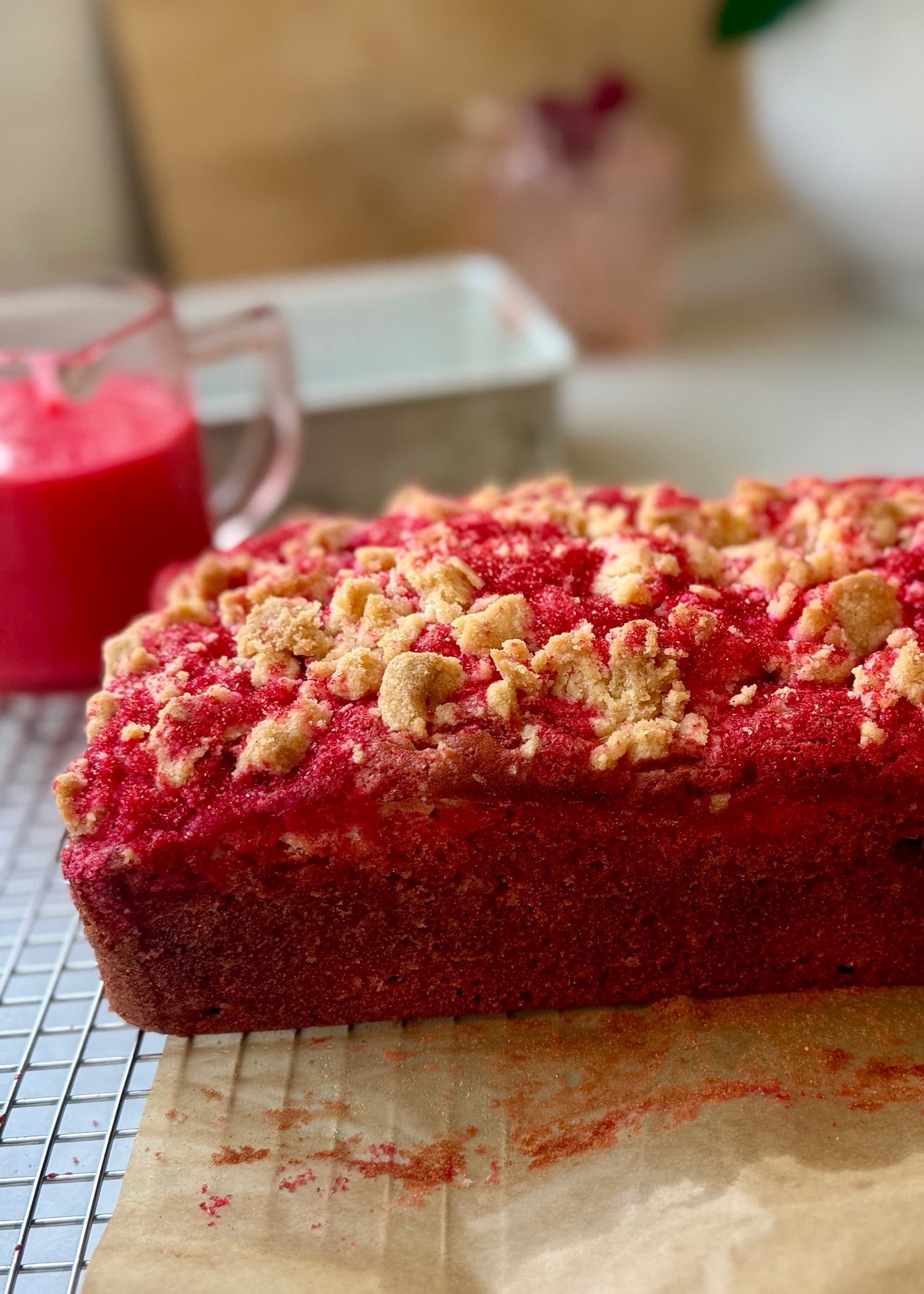 A baked cherry loaf with an unglazed streusel top