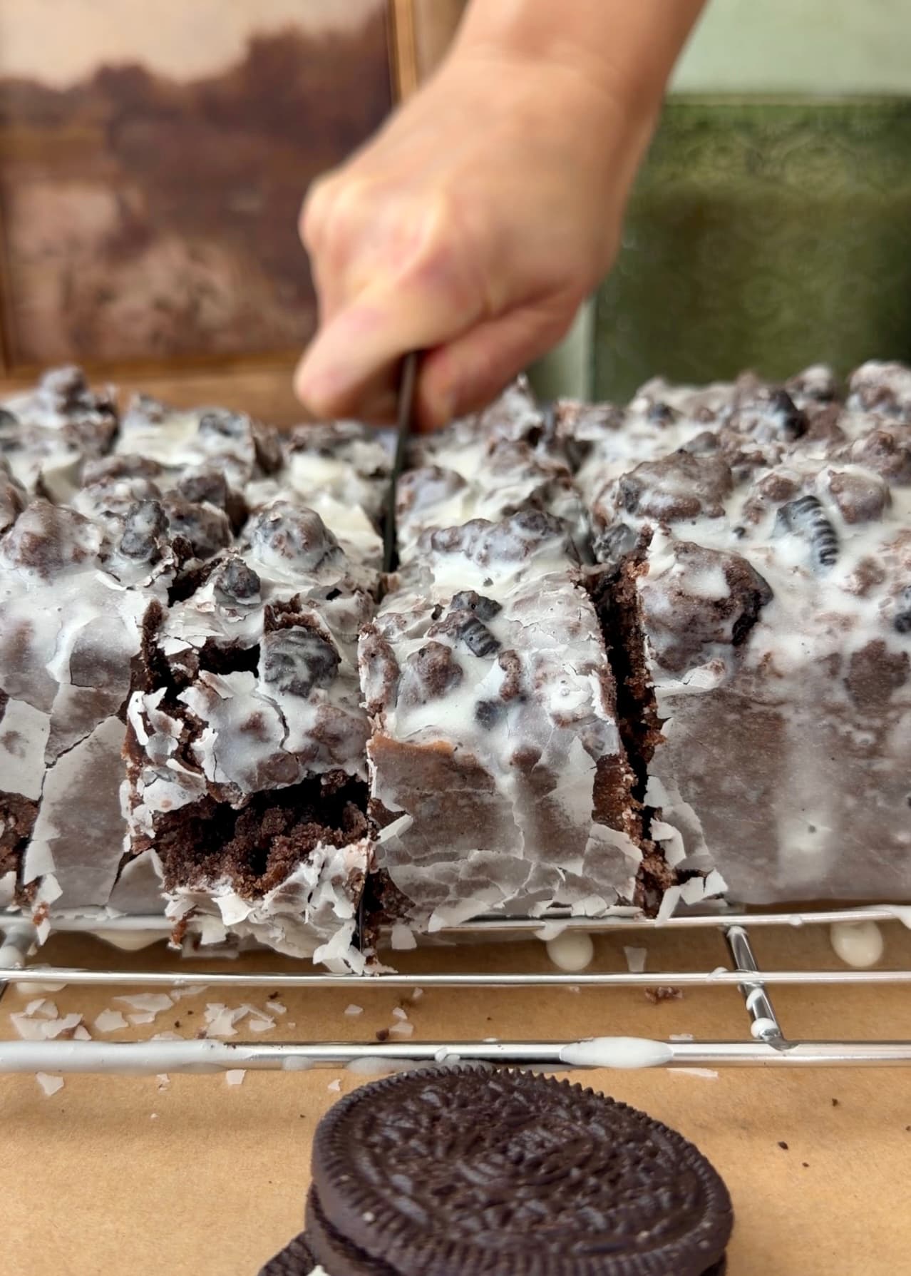 Slices separating as the glazed loaf is cut