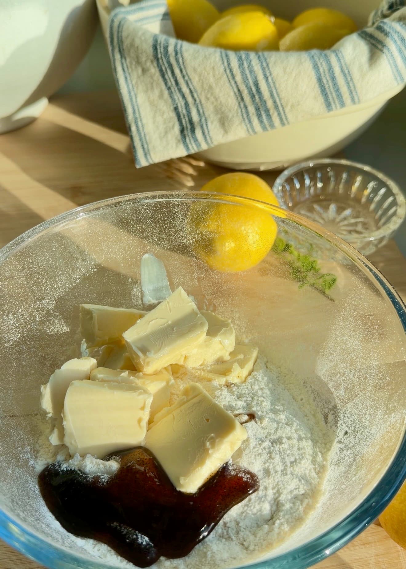 Cold butter added to flour, sugar, salt, and vanilla bean paste for streusel