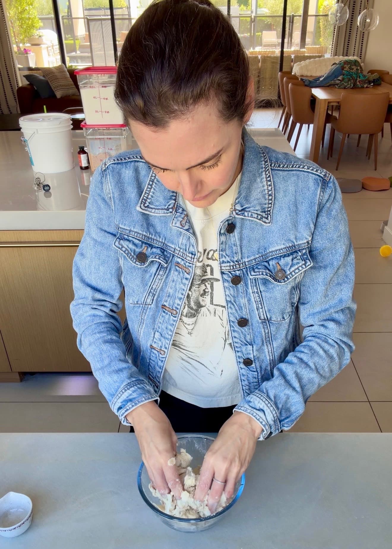 Angela working the crumble ingredients together by hand