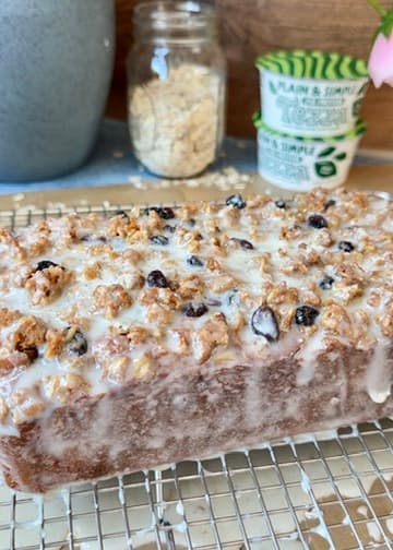 Finished Oatmeal Cookie Donut Loaf with glaze and oatmeal raisin streusel