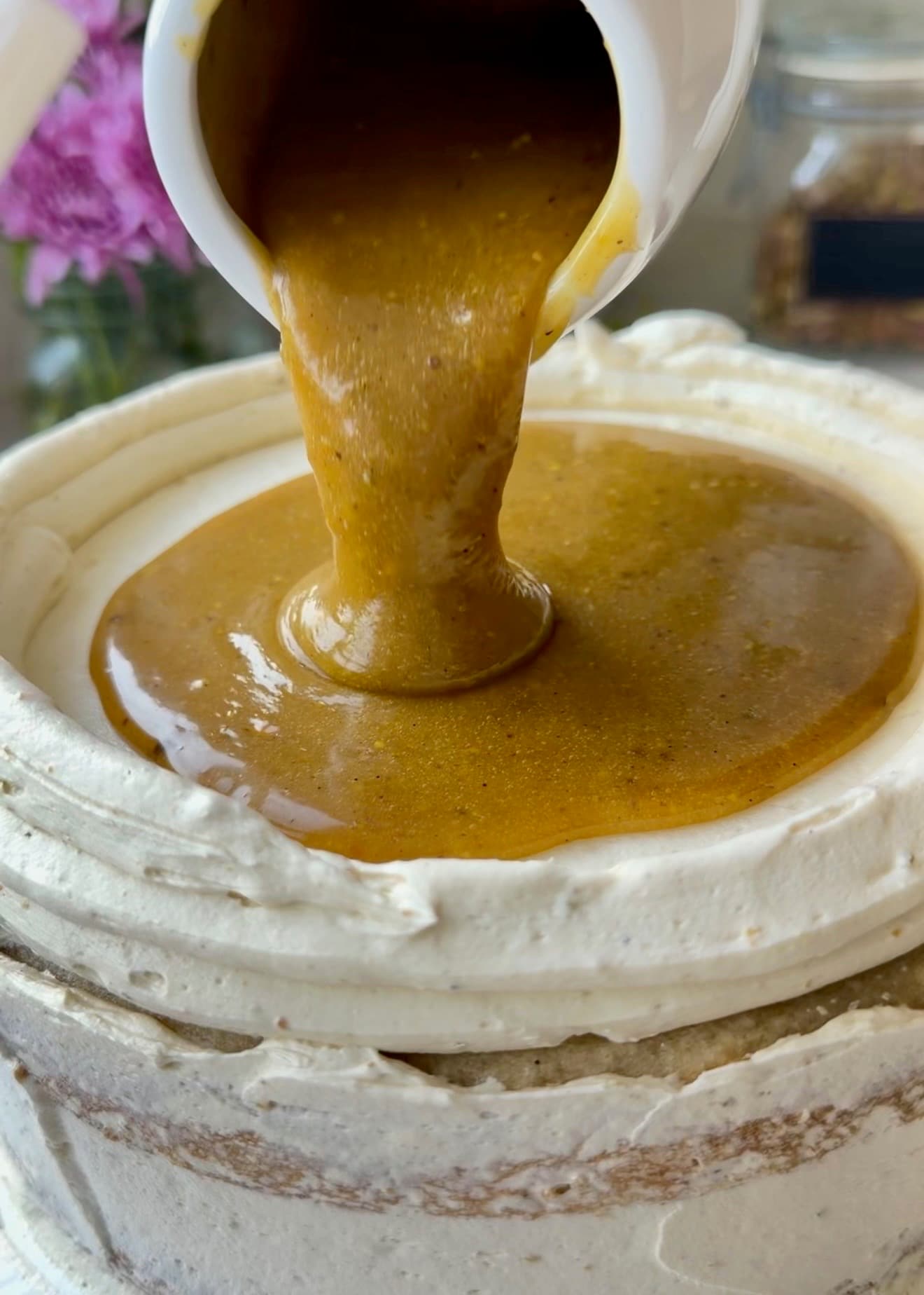 Silky pistachio lava poured inside a buttercream dam