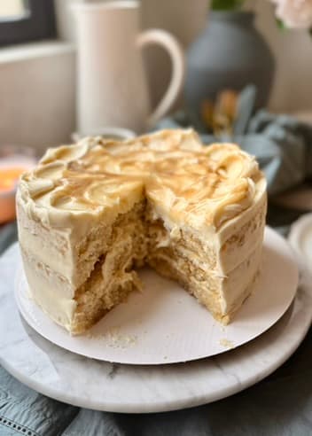 Front view of the finished cake with a wedge removed