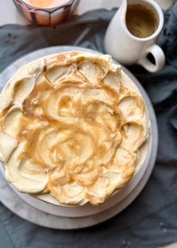 Overhead view of salted caramel swirled over the frosted blondie cake