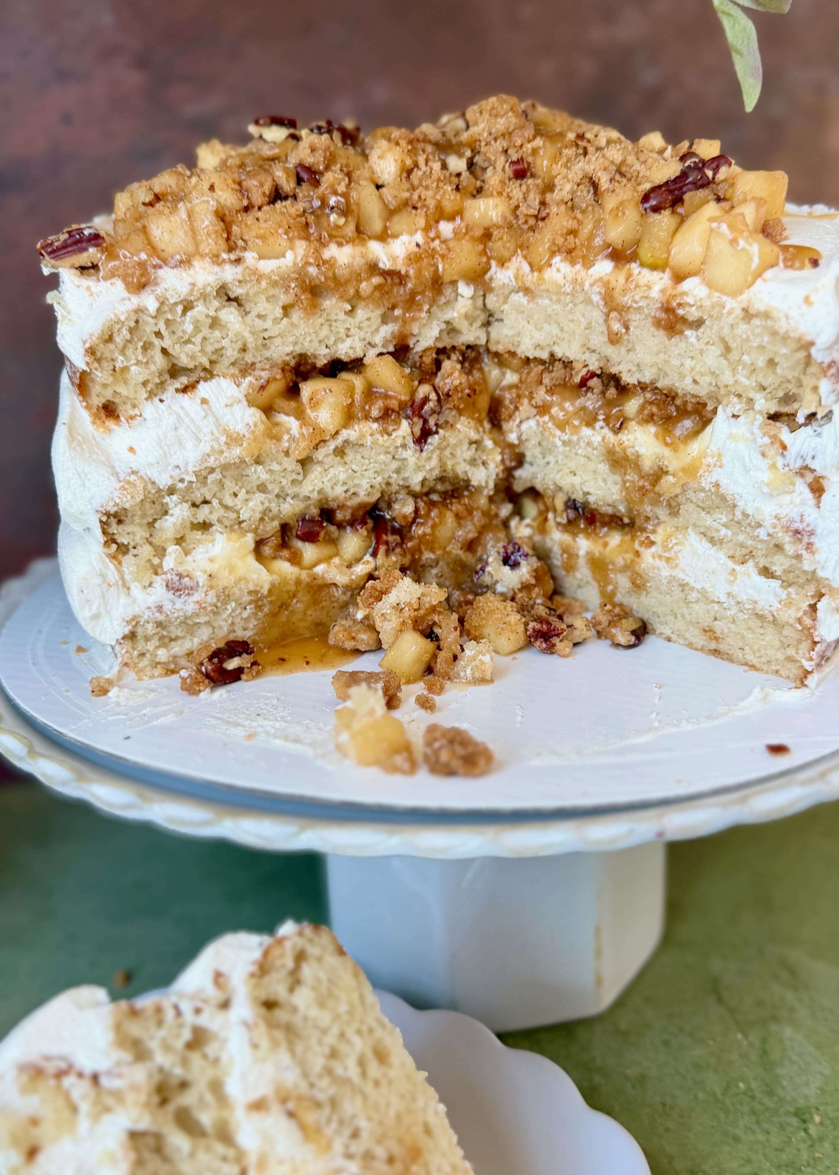 Finished Salted Caramel Dutch Apple Pie Cake cut open to show its layers