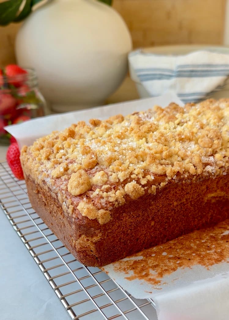Freshly baked strawberry old-fashioned donut loaf with golden streusel