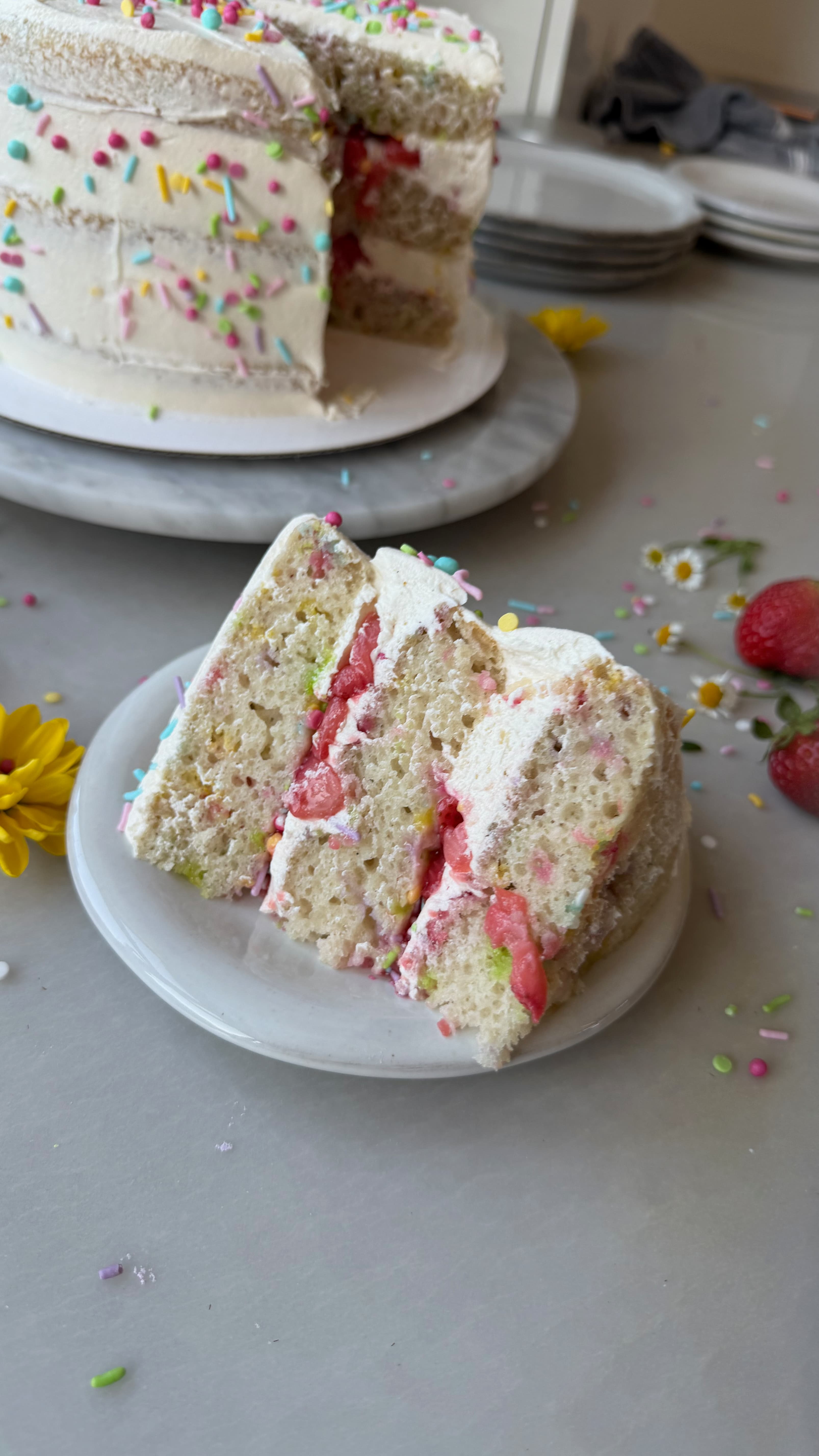 Two slices of Strawberry Shortcake Cake Batter Cake on a plate