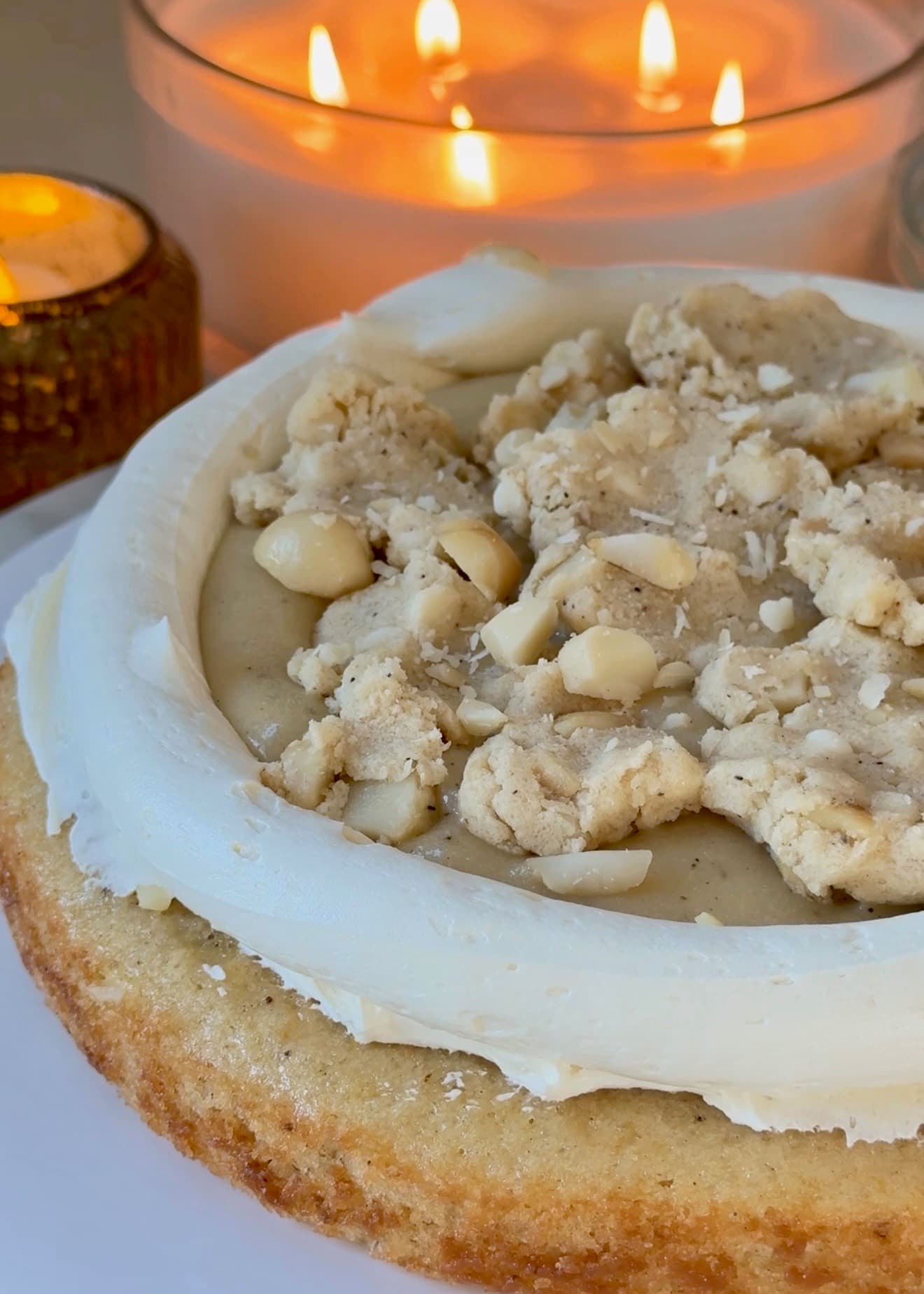 Cake layer filled with vanilla lava, cookie dough chunks, and chopped macadamia nuts