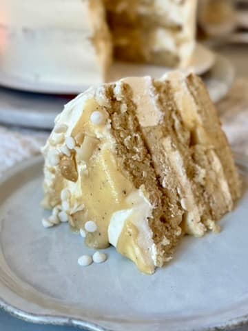 Plated slice of White Chocolate Macadamia Nut Lava Cake showing its layered filling