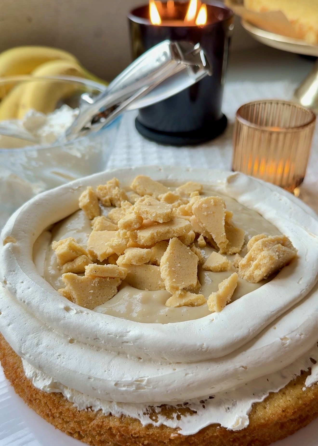 Cornbread cookie dough pieces scattered over banana cream