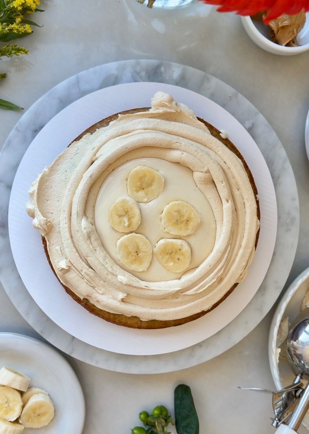 Fresh banana slices arranged over marshmallow lava filling