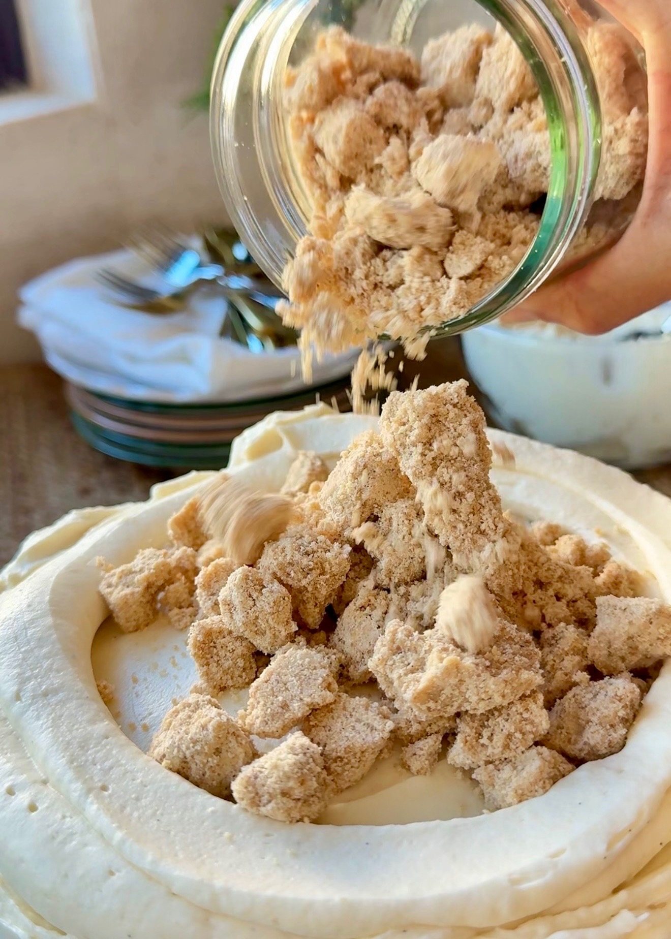 A chilled graham cracker cookie dough round placed between banana cake layers
