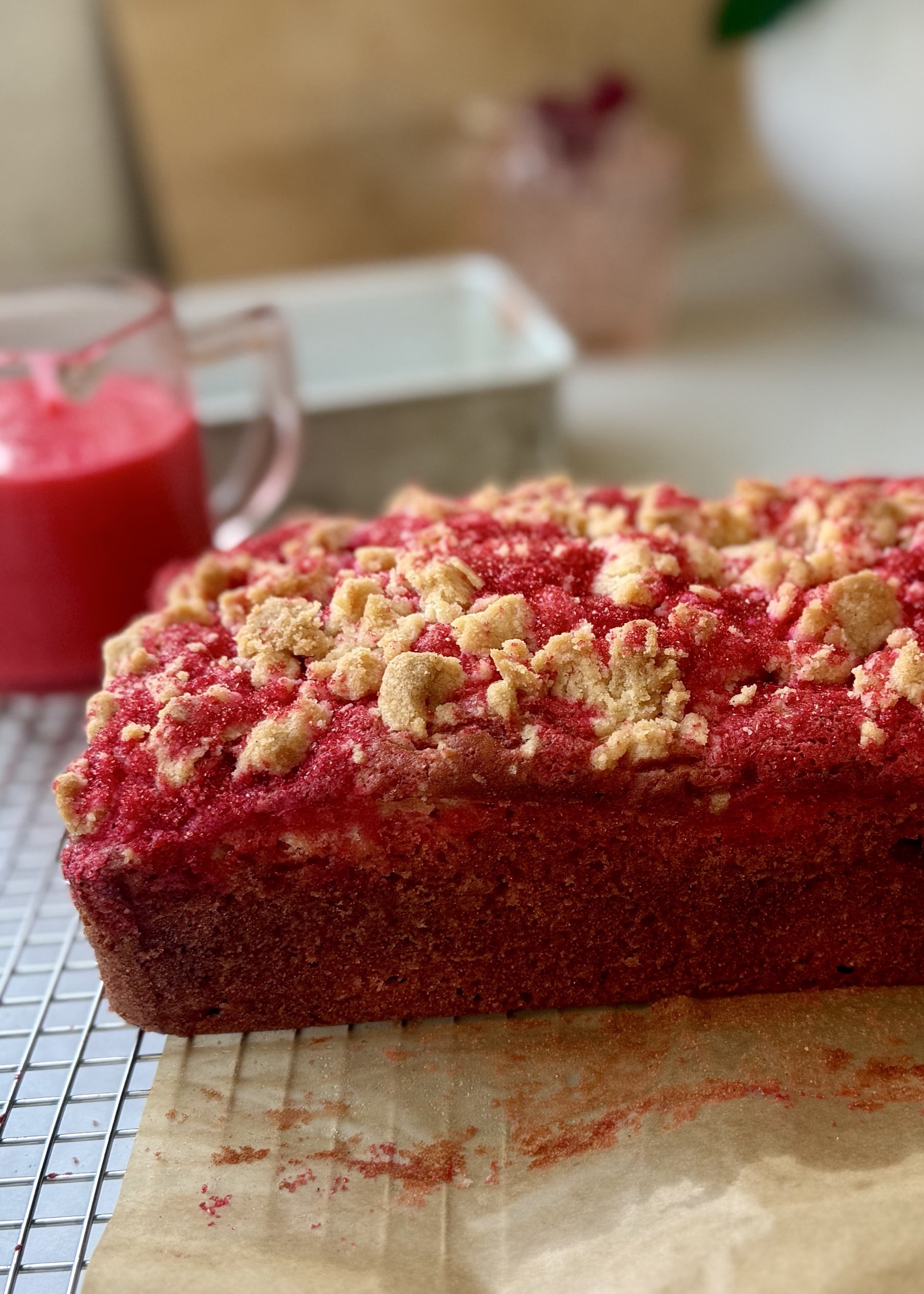 Freshly baked Cherry Old-Fashioned Donut Loaf with red sanding sugar and streusel