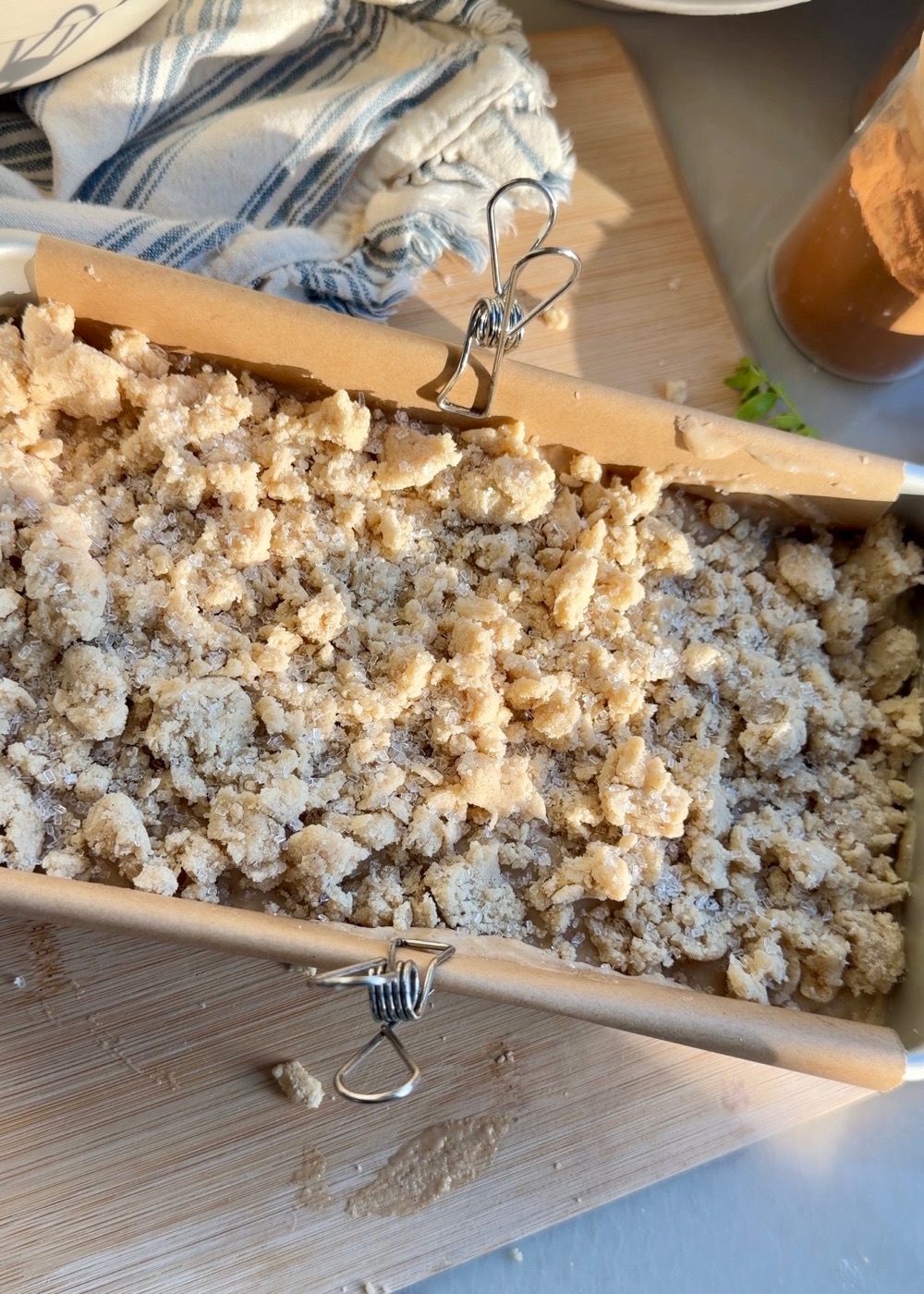 Large buttery streusel clusters covering French toast donut loaf batter