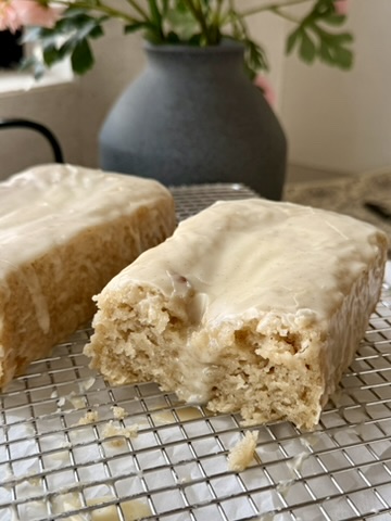 A gluten-free old-fashioned donut loaf cut open to show its tender crumb