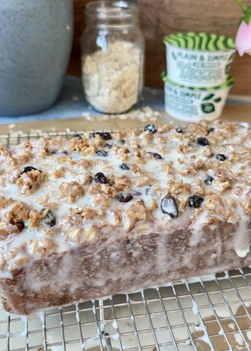 Finished Oatmeal Cookie Donut Loaf with glaze and oatmeal raisin streusel