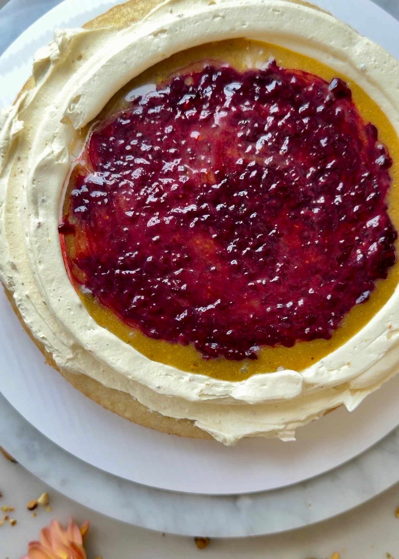 Pistachio lava and blackberry compote layered inside the cake