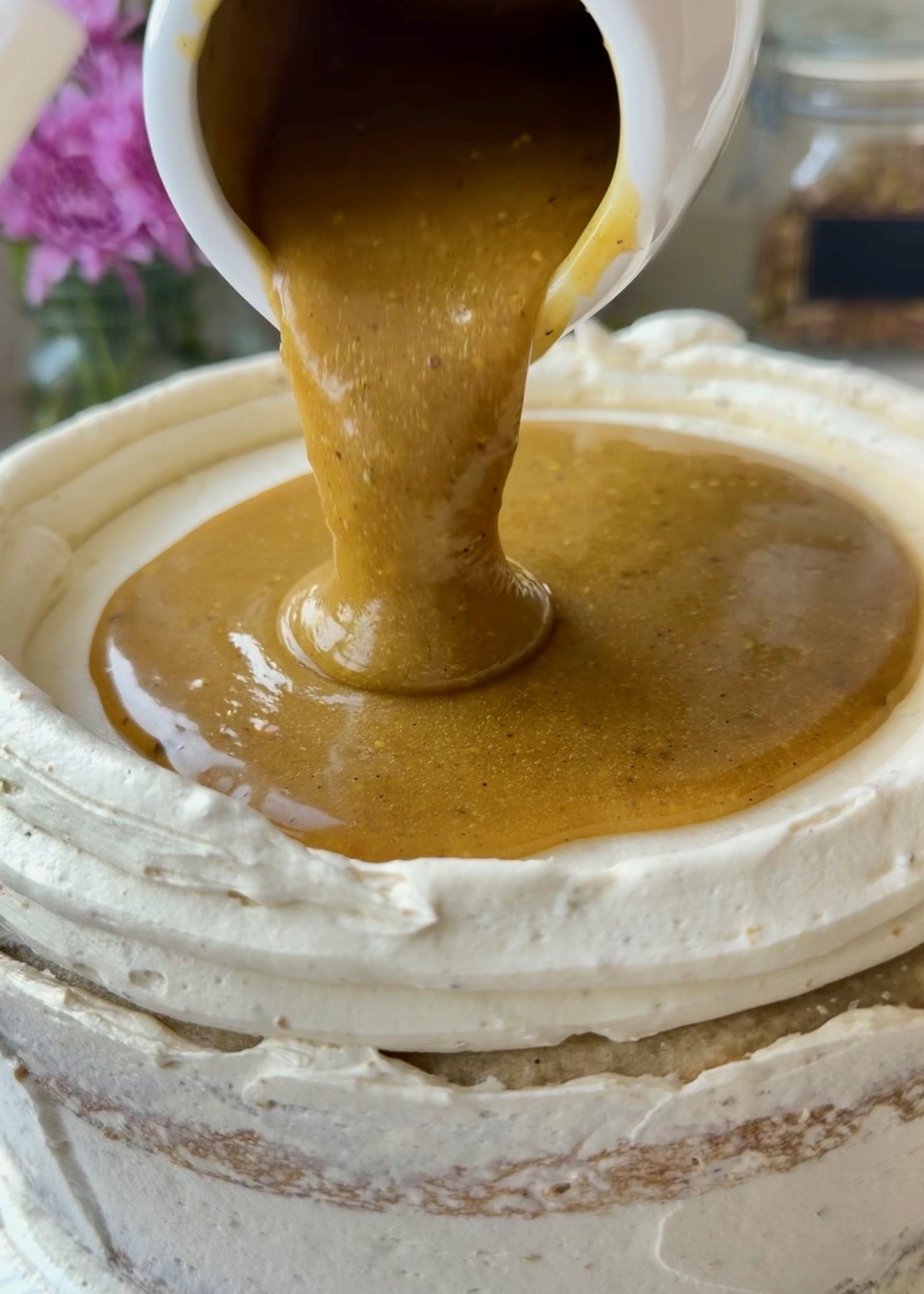 Silky pistachio lava poured inside a buttercream dam