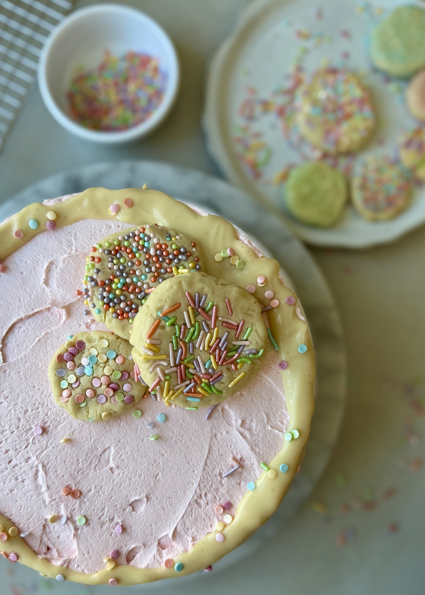 Overhead view of the completed Sugar Cookie Lava Cake decorated with pastel sugar cookies and sprinkles