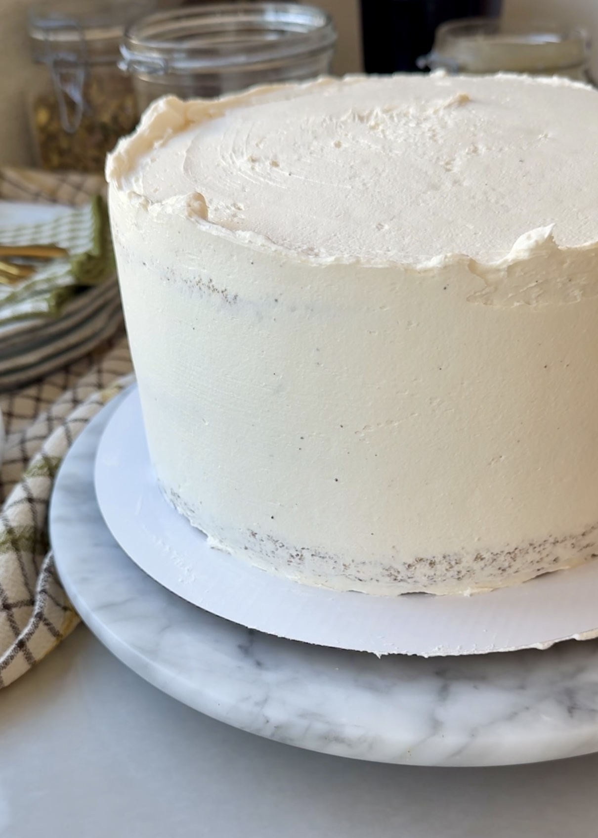 White Chocolate Blondie Lava Cake covered in a thin vanilla buttercream crumb coat